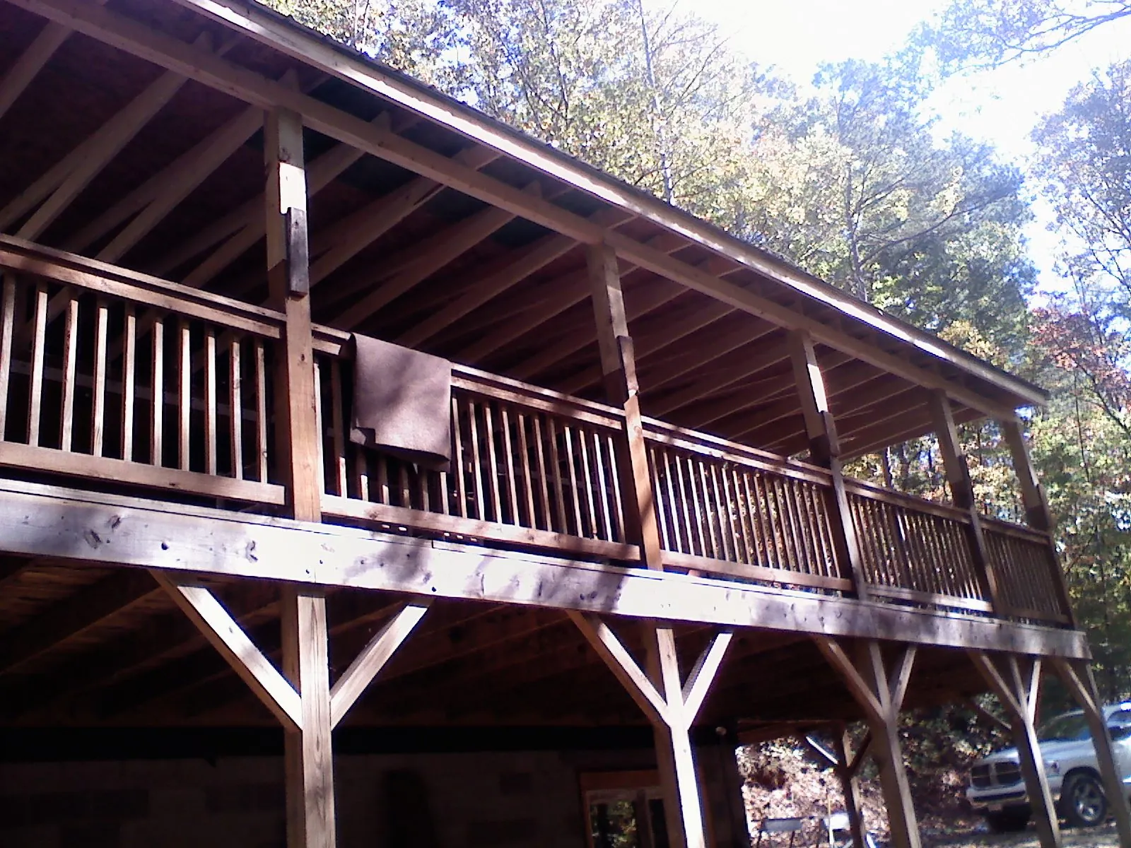 Timber framing under a new elevated porch and deck — Roof Leak Repair in Stuart by Roofing Brothers